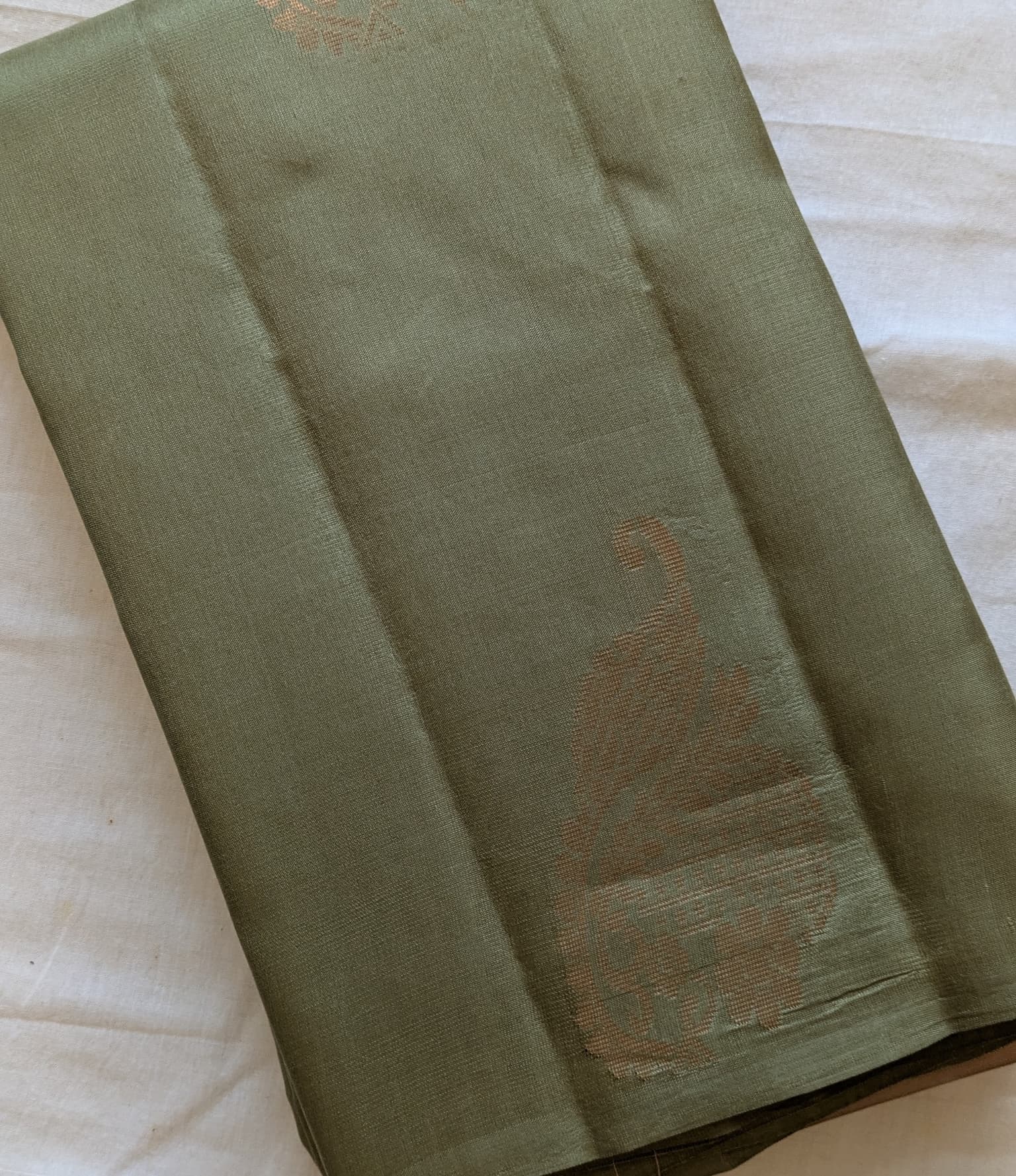 light green Kanchipuram Silk with Sage peach Pallu
